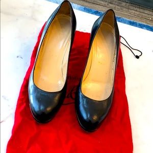 Christian Louboutin black pumps